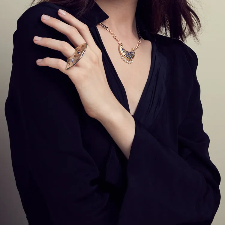 AMMANII Statement Dome Ring with Carved Stars and Moons in Vermeil Gold