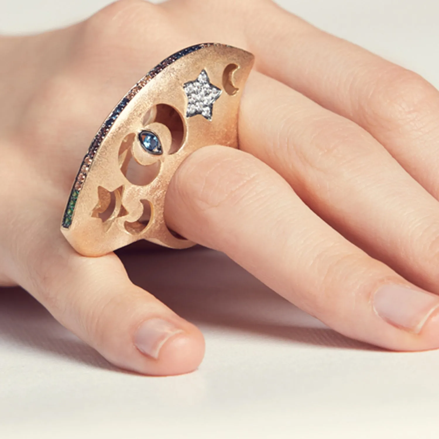 AMMANII Statement Dome Ring with Carved Stars and Moons in Vermeil Gold